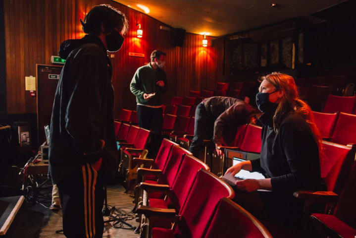Picture of people in a cinema venue