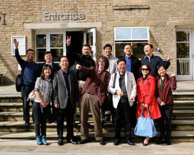 Picture of group of people weaving and smiling