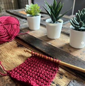 A ball of wool on a table
