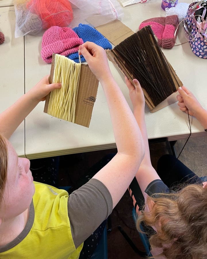Picture of young people knitting